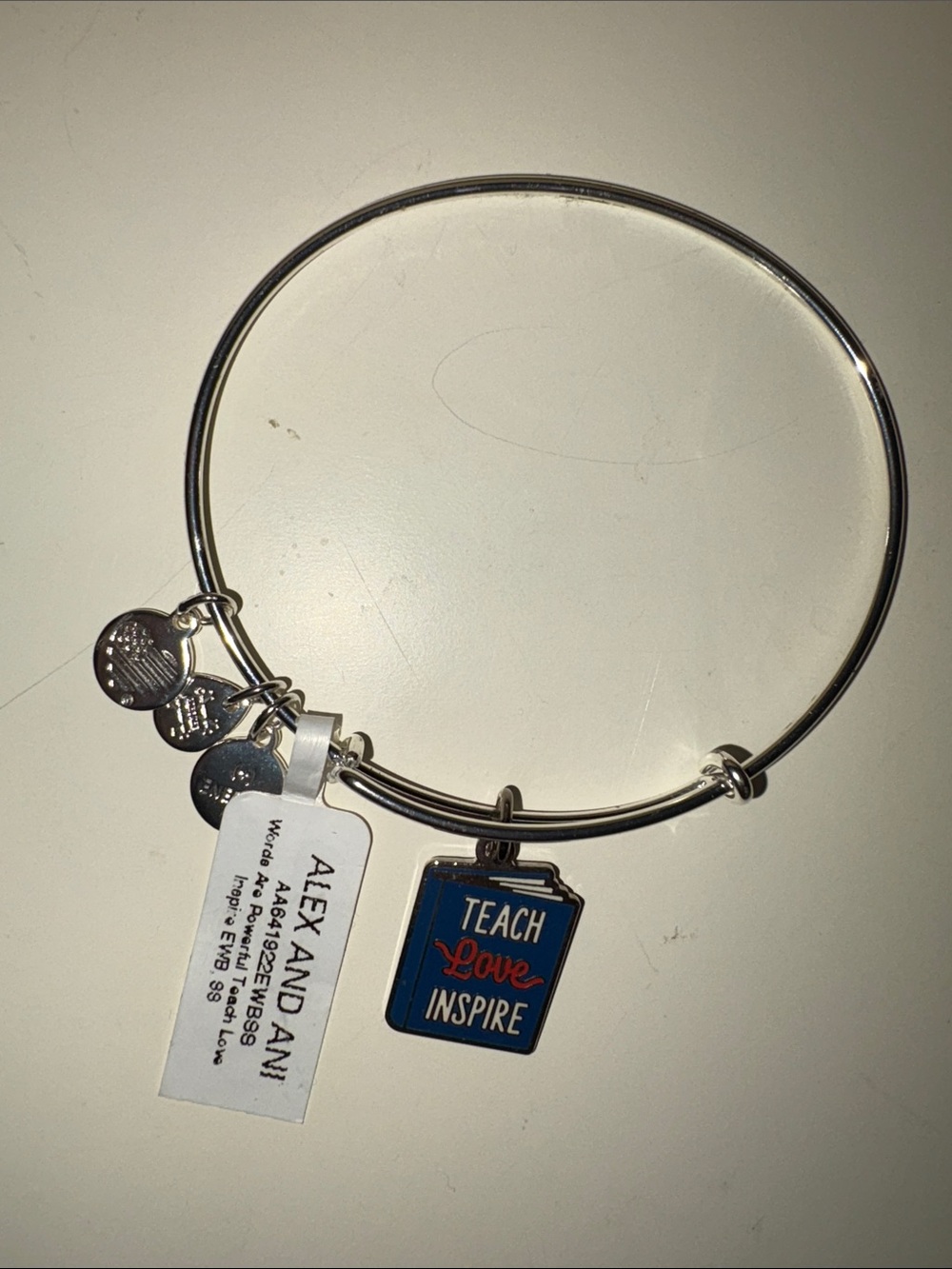 Alex and Ani Silver-tone Bangle with Blue 'Teach Love Inspire' Enamel Charm